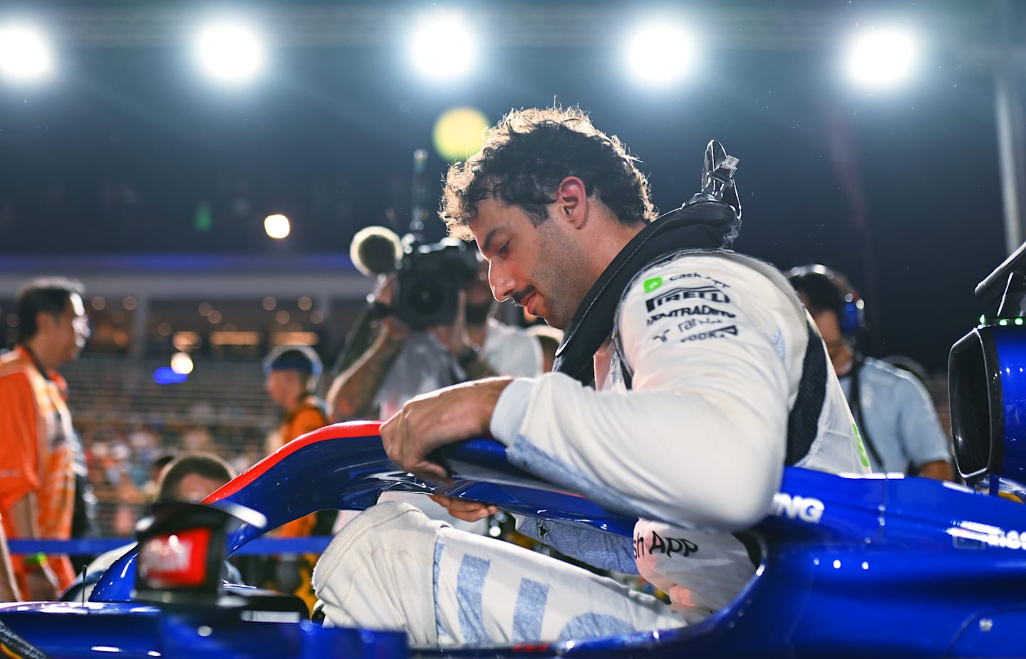 SINGAPORE, SINGAPORE - SEPTEMBER 22: Daniel Ricciardo of Australia and Visa Cash App RB on the grid