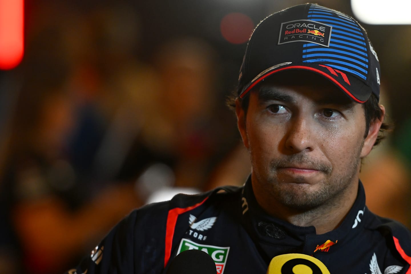 ABU DHABI, UNITED ARAB EMIRATES - DECEMBER 07: 10th placed qualifier Sergio Perez of Mexico and