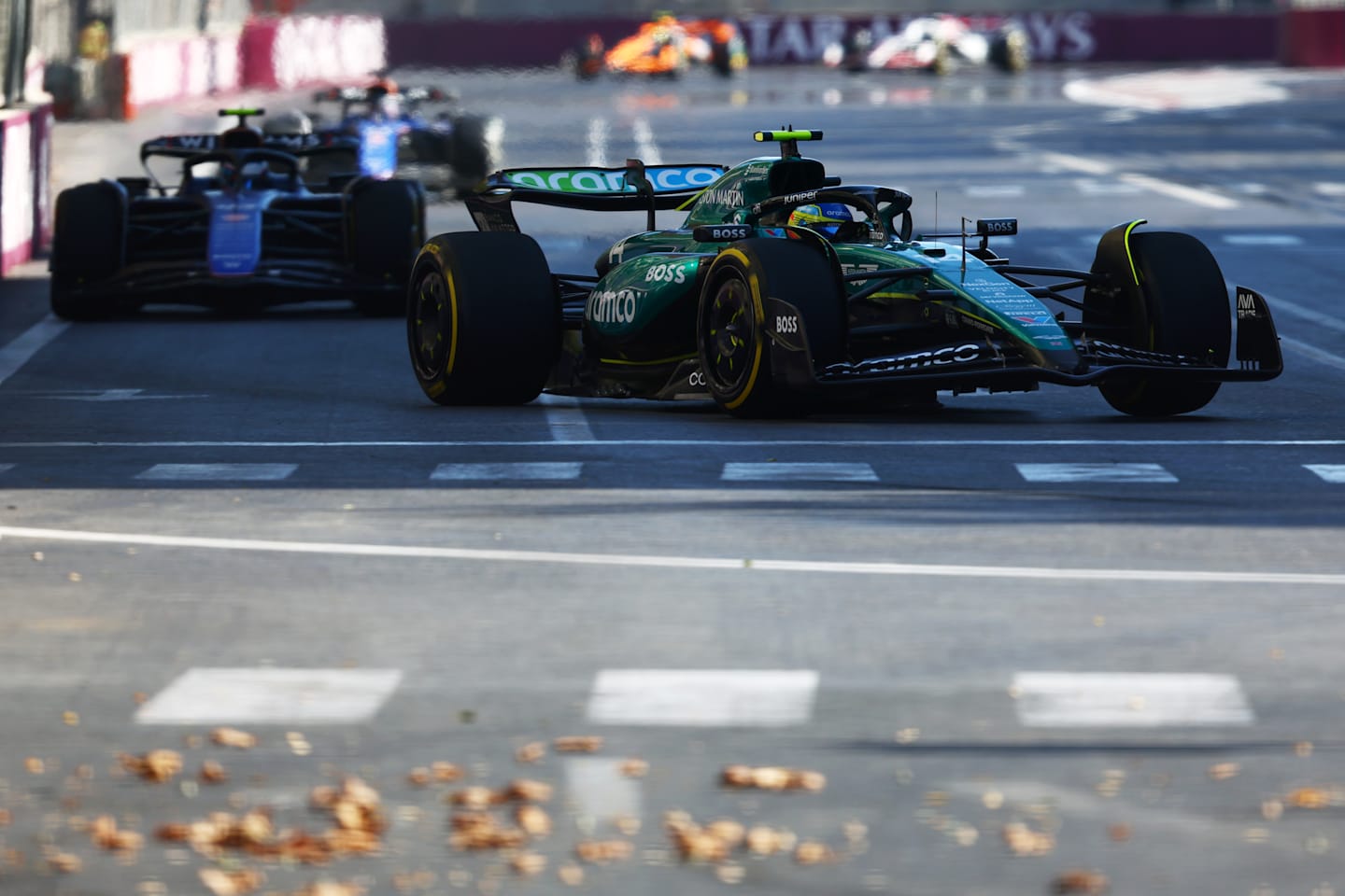 BAKU, AZERBAIJAN - SEPTEMBER 15: Fernando Alonso of Spain driving the (14) Aston Martin AMR24 Mercedes leads Franco Colapinto of Argentina driving the (43) Williams FW46 Mercedes during the F1 Grand Prix of Azerbaijan at Baku City Circuit on September 15, 2024 in Baku, Azerbaijan. (Photo by Joe Portlock - Formula 1/Formula 1 via Getty Images)