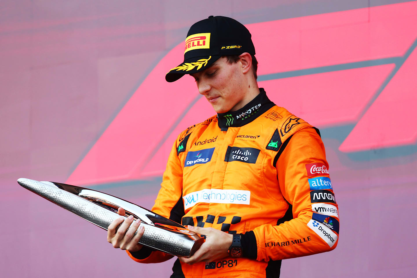 BAKU, AZERBAIJAN - SEPTEMBER 15: Race winner Oscar Piastri of Australia and McLaren celebrates on the podium during the F1 Grand Prix of Azerbaijan at Baku City Circuit on September 15, 2024 in Baku, Azerbaijan. (Photo by Joe Portlock - Formula 1/Formula 1 via Getty Images)