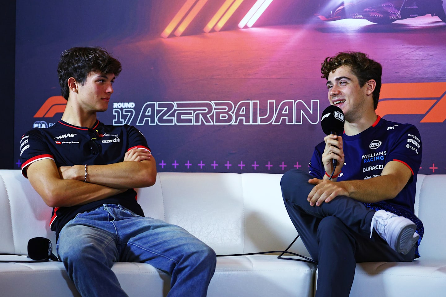 BAKU, AZERBAIJAN - SEPTEMBER 12: Oliver Bearman of Great Britain and Haas F1 and Franco Colapinto of Argentina and Williams attend the Drivers Press Conference during previews ahead of the F1 Grand Prix of Azerbaijan. (Photo by Clive Rose/Getty Images)