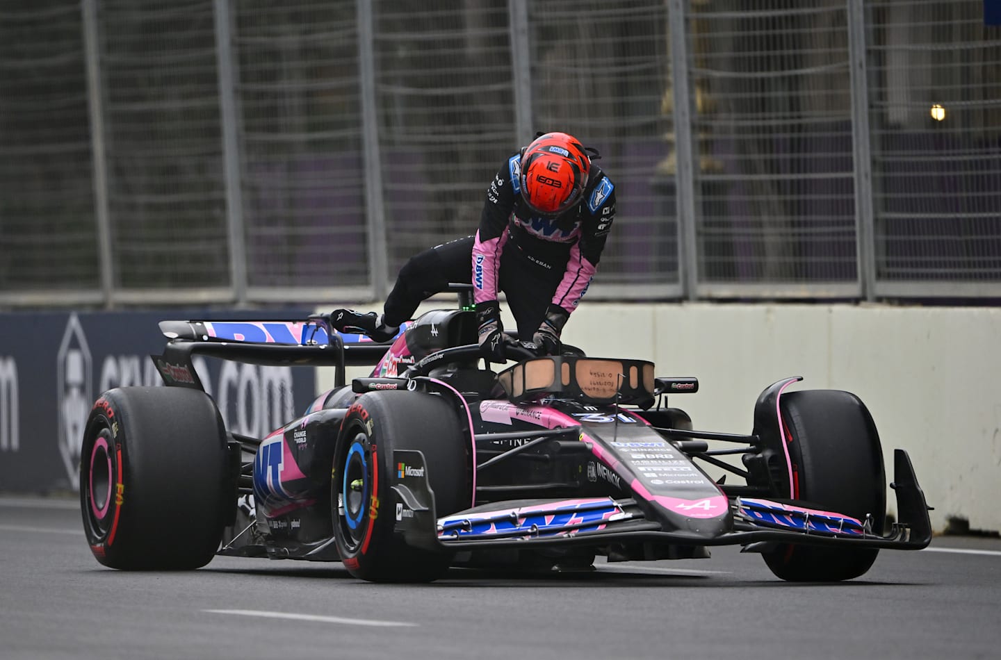 BAKU, AZERBAIJAN - SEPTEMBER 14: Esteban Ocon of France and Alpine F1 climbs from his car after stopping on track during final practice ahead of the F1 Grand Prix of Azerbaijan at Baku City Circuit on September 14, 2024 in Baku, Azerbaijan. (Photo by Dan Mullan/Getty Images)