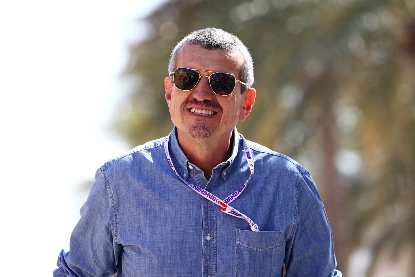 BAHRAIN, BAHRAIN - FEBRUARY 29: Guenther Steiner walks in the Paddock prior to practice ahead of