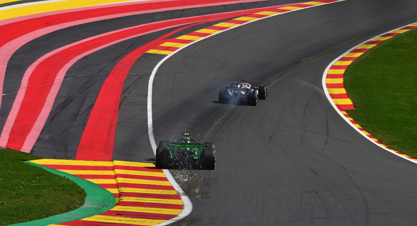 SPA, BELGIUM - JULY 28: Sparks fly behind Zhou Guanyu of China driving the (24) Kick Sauber C44 Ferrari during the F1 Grand Prix of Belgium at Circuit de Spa-Francorchamps on July 28, 2024 in Spa, Belgium. (Photo by Rudy Carezzevoli/Getty Images)