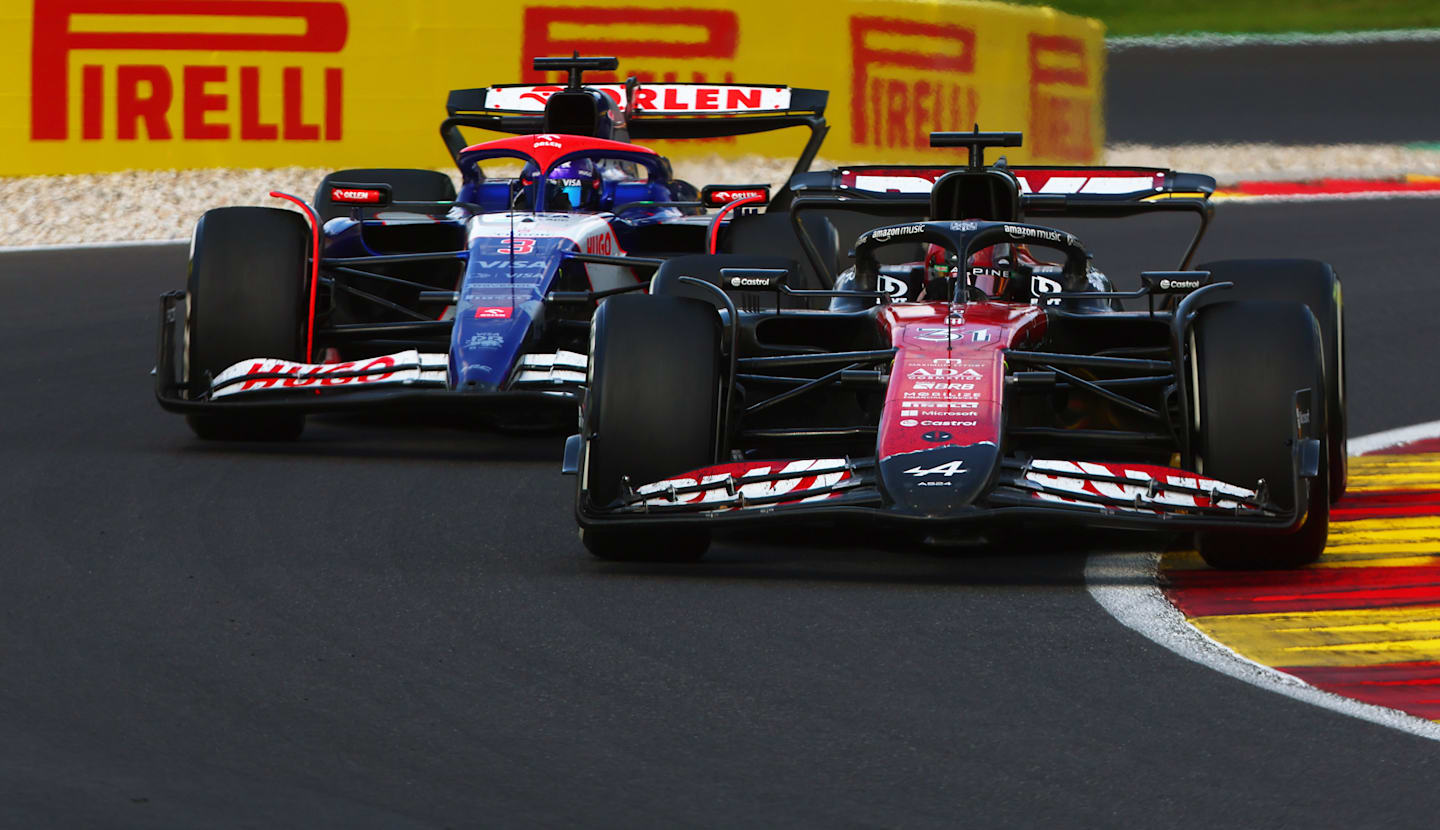 SPA, BELGIUM - JULY 28: Esteban Ocon of France driving the (31) Alpine F1 A524 Renault leads Daniel Ricciardo of Australia driving the (3) Visa Cash App RB VCARB 01 on track during the F1 Grand Prix of Belgium at Circuit de Spa-Francorchamps on July 28, 2024 in Spa, Belgium. (Photo by Joe Portlock - Formula 1/Formula 1 via Getty Images)