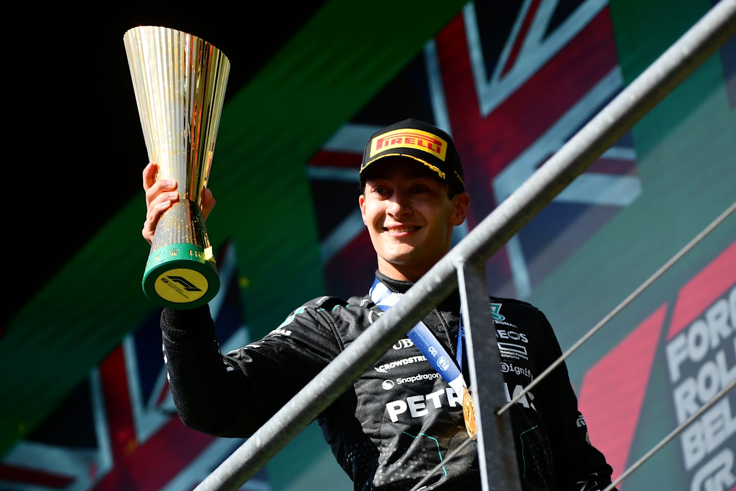 SPA, BELGIUM - JULY 28: Race winner George Russell of Great Britain and Mercedes celebrates on the podium during the F1 Grand Prix of Belgium at Circuit de Spa-Francorchamps on July 28, 2024 in Spa, Belgium. (Photo by James Sutton - Formula 1/Formula 1 via Getty Images)