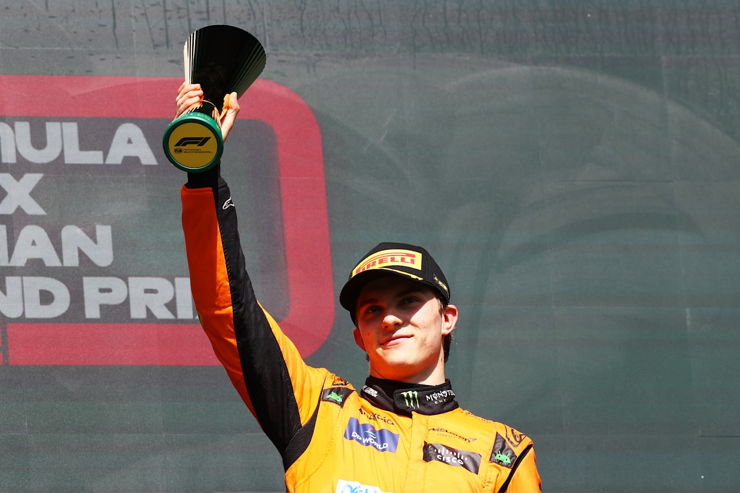 SPA, BELGIUM - JULY 28: Third placed Oscar Piastri of Australia and McLaren celebrates on the podium during the F1 Grand Prix of Belgium at Circuit de Spa-Francorchamps on July 28, 2024 in Spa, Belgium. (Photo by Peter Fox - Formula 1/Formula 1 via Getty Images)