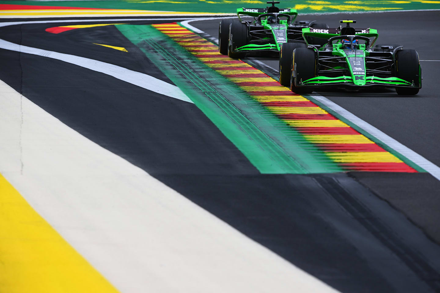 SPA, BELGIUM - JULY 26: Zhou Guanyu of China driving the (24) Kick Sauber C44 Ferrari leads teammate Valtteri Bottas of Finland driving the (77) Kick Sauber C44 Ferrari on track during practice ahead of the F1 Grand Prix of Belgium at Circuit de Spa-Francorchamps on July 26, 2024 in Spa, Belgium. (Photo by Rudy Carezzevoli/Getty Images)