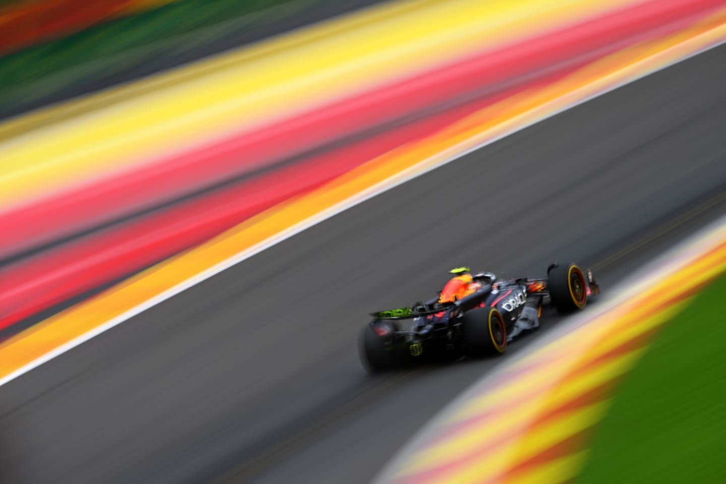 SPA, BELGIUM - JULY 26: Sergio Perez of Mexico driving the (11) Oracle Red Bull Racing RB20 on