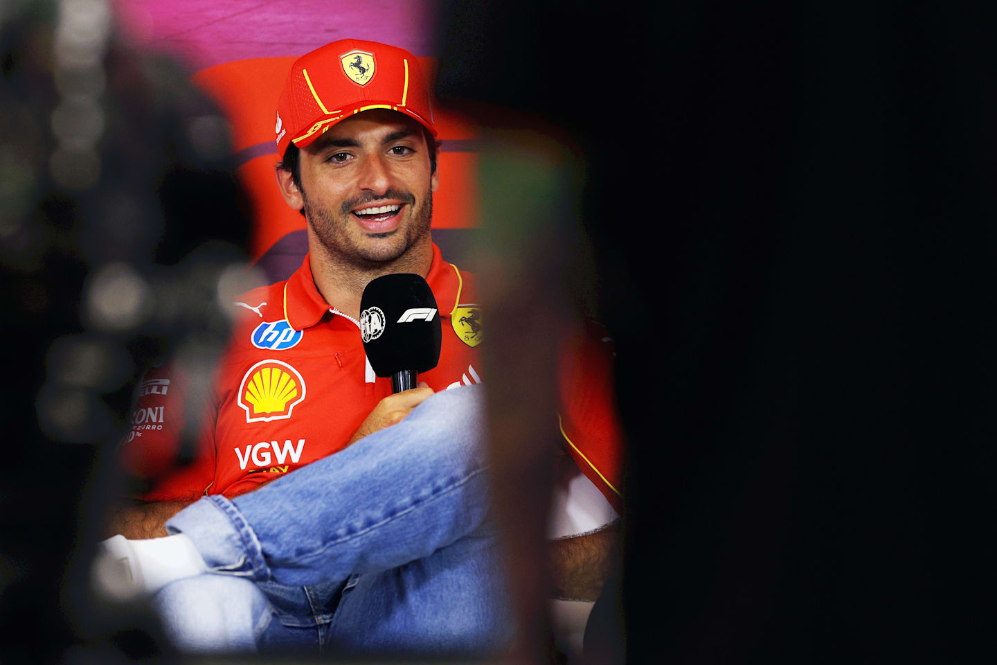 SPA, BELGIUM - JULY 25: Carlos Sainz of Spain and Ferrari attends the Drivers Press Conference during previews ahead of the F1 Grand Prix of Belgium at Circuit de Spa-Francorchamps on July 25, 2024 in Spa, Belgium. (Photo by Dean Mouhtaropoulos/Getty Images)