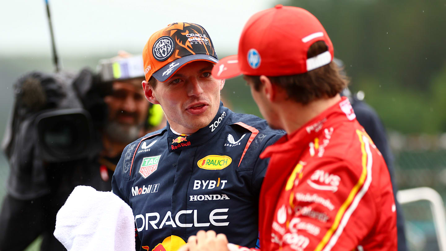 SPA, BELGIUM - JULY 27: Pole position qualifier Max Verstappen of the Netherlands and Oracle Red Bull Racing talks with Second placed qualifier Charles Leclerc of Monaco and Ferrari in parc ferme during qualifying ahead of the F1 Grand Prix of Belgium at Circuit de Spa-Francorchamps on July 27, 2024 in Spa, Belgium. (Photo by Bryn Lennon - Formula 1/Formula 1 via Getty Images)