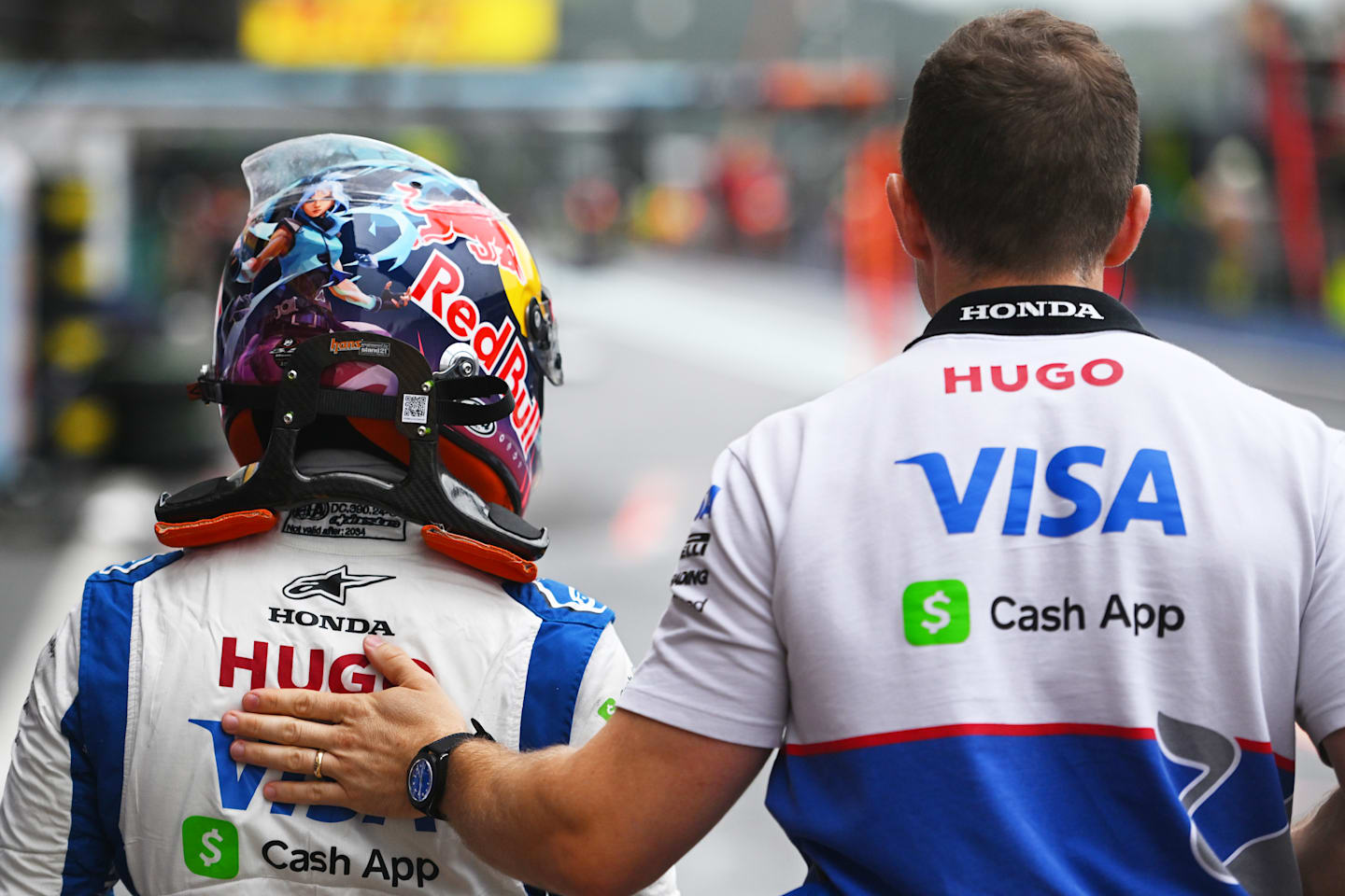 SPA, BELGIUM - JULY 27: 18th placed qualifier Yuki Tsunoda of Japan and Visa Cash App RB walks in the Pitlane during qualifying ahead of the F1 Grand Prix of Belgium at Circuit de Spa-Francorchamps on July 27, 2024 in Spa, Belgium. (Photo by Rudy Carezzevoli/Getty Images)