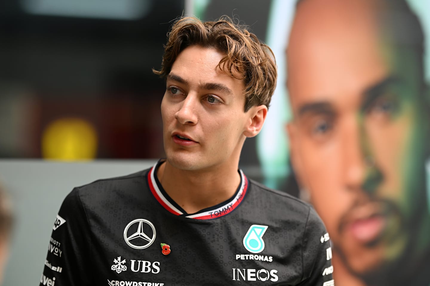 SAO PAULO, BRAZIL - OCTOBER 31: George Russell of Great Britain and Mercedes looks on in the Paddock ahead of the F1 Grand Prix of Brazil at Autodromo Jose Carlos Pace on October 31, 2024 in Sao Paulo, Brazil. (Photo by Clive Mason/Getty Images)