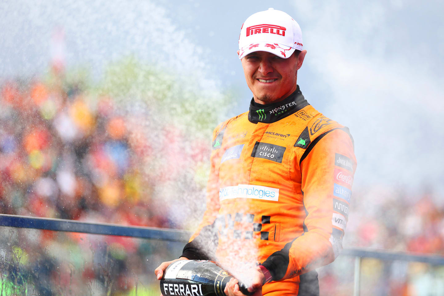 MONTREAL, QUEBEC - JUNE 09: Second placed Lando Norris of Great Britain and McLaren celebrates on the podium after the F1 Grand Prix of Canada at Circuit Gilles Villeneuve on June 09, 2024 in Montreal, Quebec. (Photo by Bryn Lennon - Formula 1/Formula 1 via Getty Images)