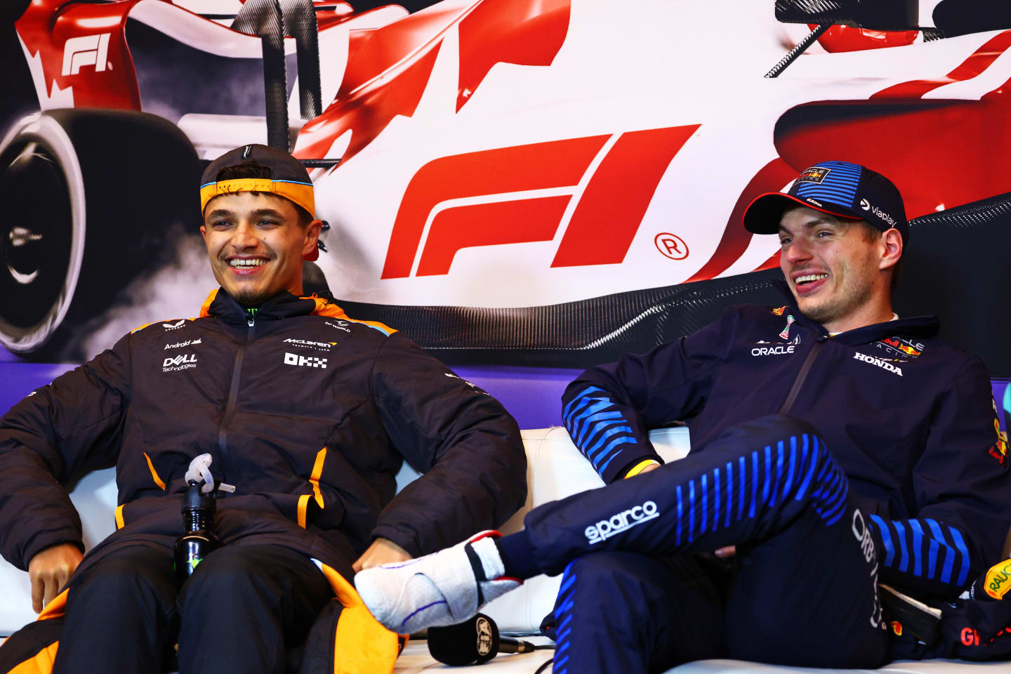 MONTREAL, QUEBEC - JUNE 09: Race winner Max Verstappen of the Netherlands and Oracle Red Bull Racing and Second placed Lando Norris of Great Britain and McLaren attend the press conference after the F1 Grand Prix of Canada at Circuit Gilles Villeneuve on June 09, 2024 in Montreal, Quebec. (Photo by Clive Rose/Getty Images)