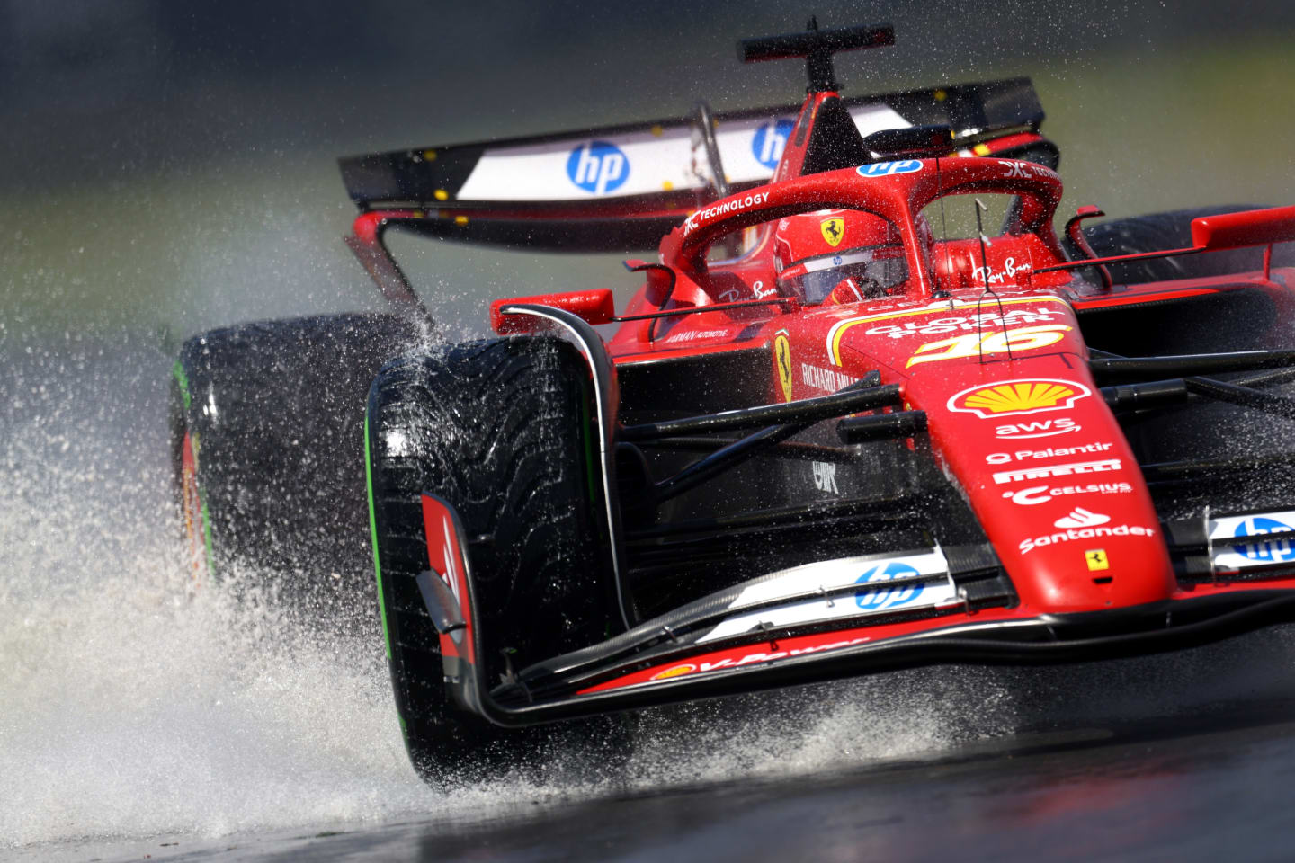 MONTREAL, QUEBEC - JUNE 07: Charles Leclerc of Monaco driving the (16) Ferrari SF-24 runs through a puddle on track during practice ahead of the F1 Grand Prix of Canada at Circuit Gilles Villeneuve on June 07, 2024 in Montreal, Quebec. (Photo by Clive Rose/Getty Images)