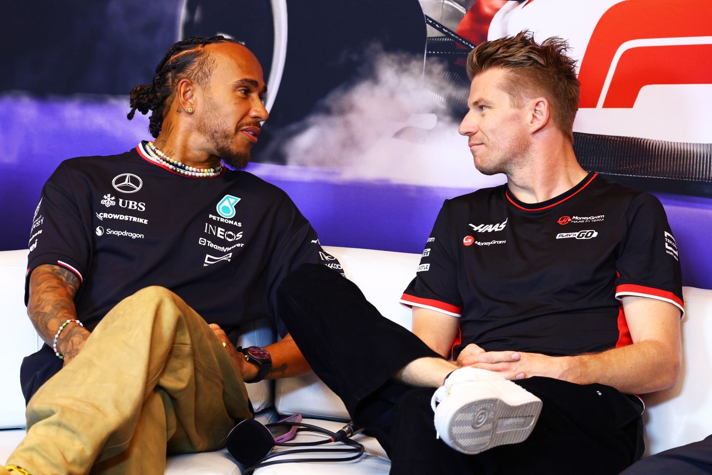 MONTREAL, QUEBEC - JUNE 06: Lewis Hamilton of Great Britain and Mercedes and Nico Hulkenberg of Germany and Haas F1 attend the press conference during previews ahead of the F1 Grand Prix of Canada at Circuit Gilles Villeneuve on June 06, 2024 in Montreal, Quebec. (Photo by Clive Rose/Getty Images)