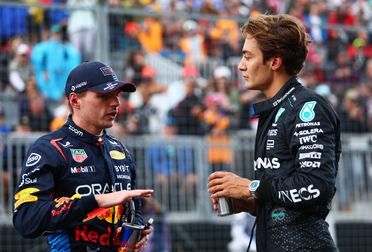 MONTREAL, QUEBEC - JUNE 08: Pole position qualifier George Russell of Great Britain and Mercedes and Second placed qualifier Max Verstappen of the Netherlands and Oracle Red Bull Racing in parc ferme after qualifying ahead of the F1 Grand Prix of Canada at Circuit Gilles Villeneuve on June 08, 2024 in Montreal, Quebec. (Photo by Bryn Lennon - Formula 1/Formula 1 via Getty Images)