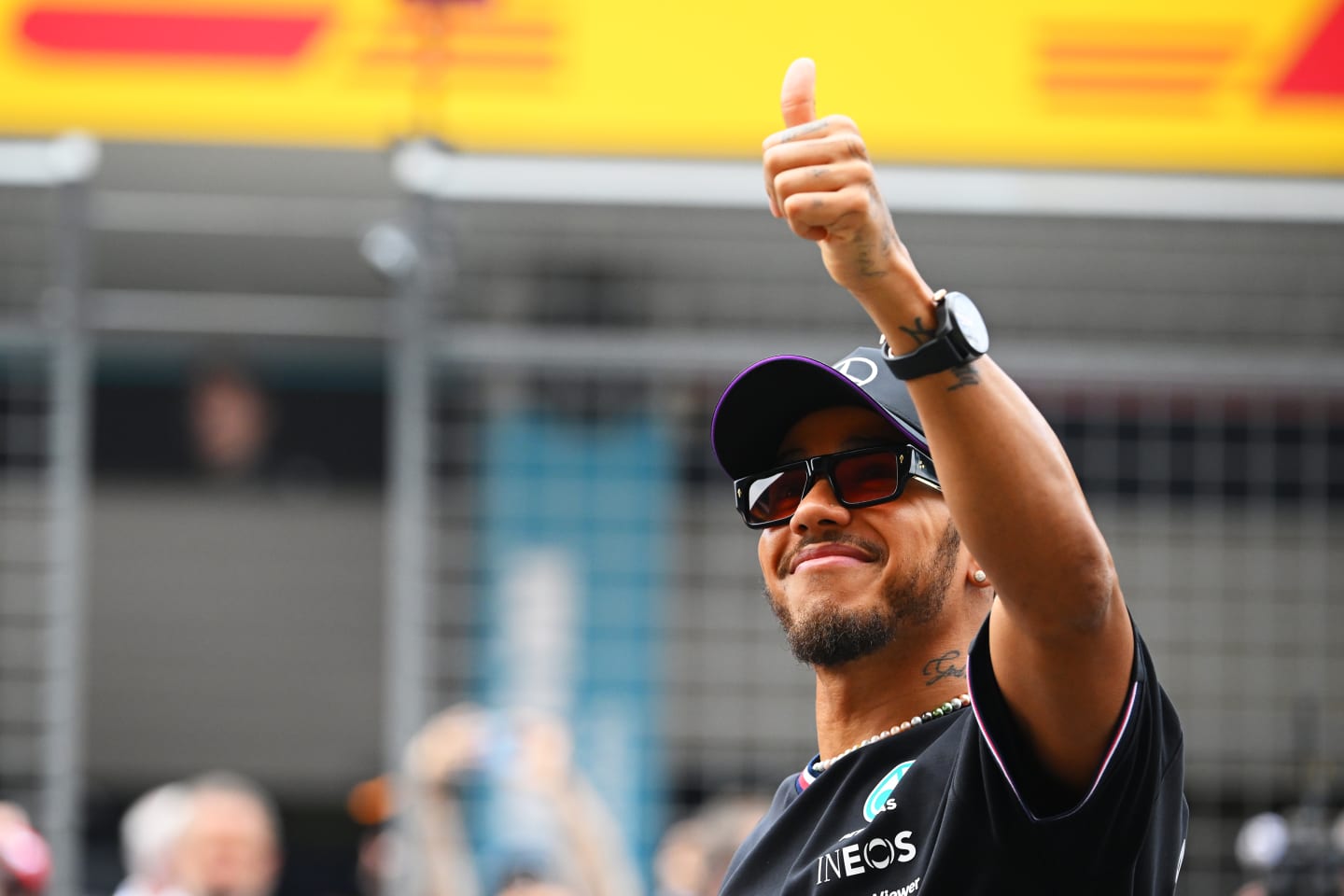 SHANGHAI, CHINA - APRIL 21: Lewis Hamilton of Great Britain and Mercedes waves to the crowd on the