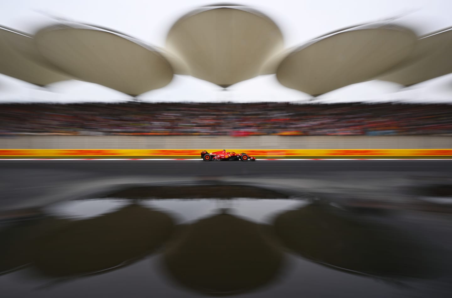 SHANGHAI, CHINA - APRIL 21: Carlos Sainz of Spain driving (55) the Ferrari SF-24 on track during the F1 Grand Prix of China at Shanghai International Circuit on April 21, 2024 in Shanghai, China. (Photo by Clive Mason - Formula 1/Formula 1 via Getty Images)