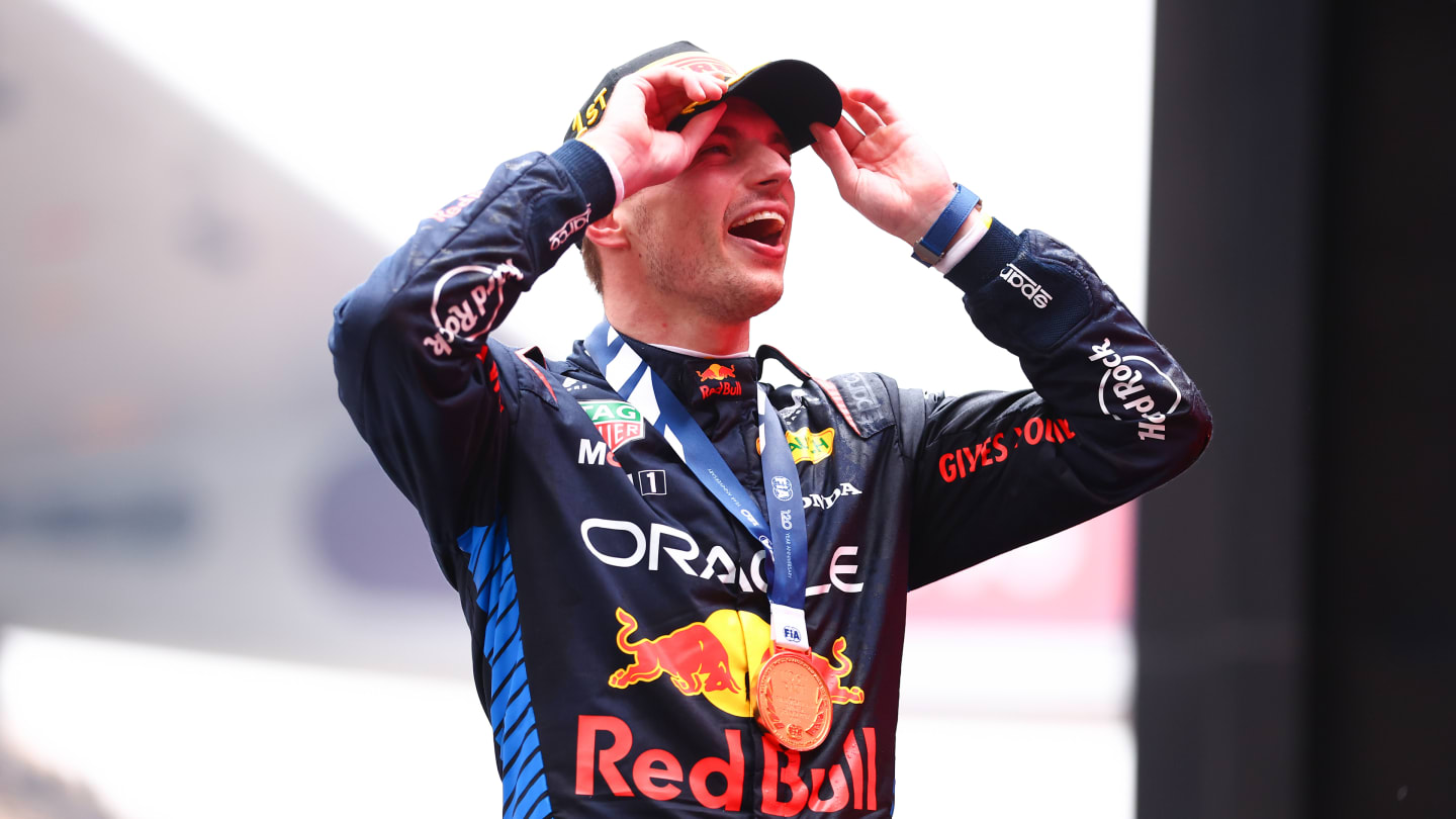 SHANGHAI, CHINA - APRIL 21: Race winner Max Verstappen of the Netherlands and Oracle Red Bull Racing celebrates on the podium after the F1 Grand Prix of China at Shanghai International Circuit on April 21, 2024 in Shanghai, China. (Photo by Bryn Lennon - Formula 1/Formula 1 via Getty Images)