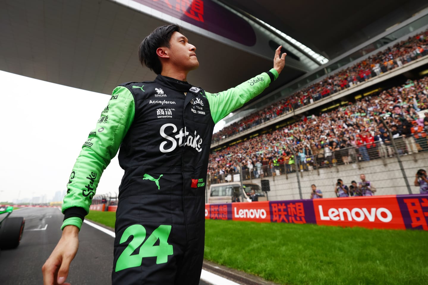 SHANGHAI, CHINA - APRIL 21: 14th placed Zhou Guanyu of China and Stake F1 Team Kick Sauber
