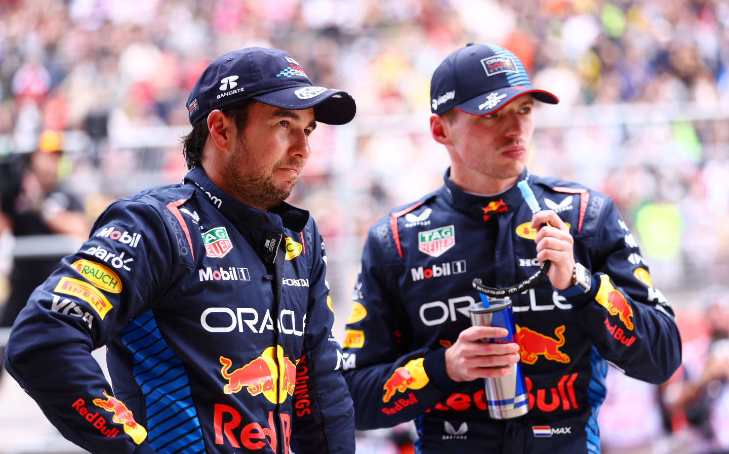 SHANGHAI, CHINA - APRIL 20: Sprint winner Max Verstappen of the Netherlands and Oracle Red Bull Racing and Third placed Sergio Perez of Mexico and Oracle Red Bull Racing look on in parc ferme during the Sprint ahead of the F1 Grand Prix of China at Shanghai International Circuit on April 20, 2024 in Shanghai, China. (Photo by Bryn Lennon - Formula 1/Formula 1 via Getty Images)