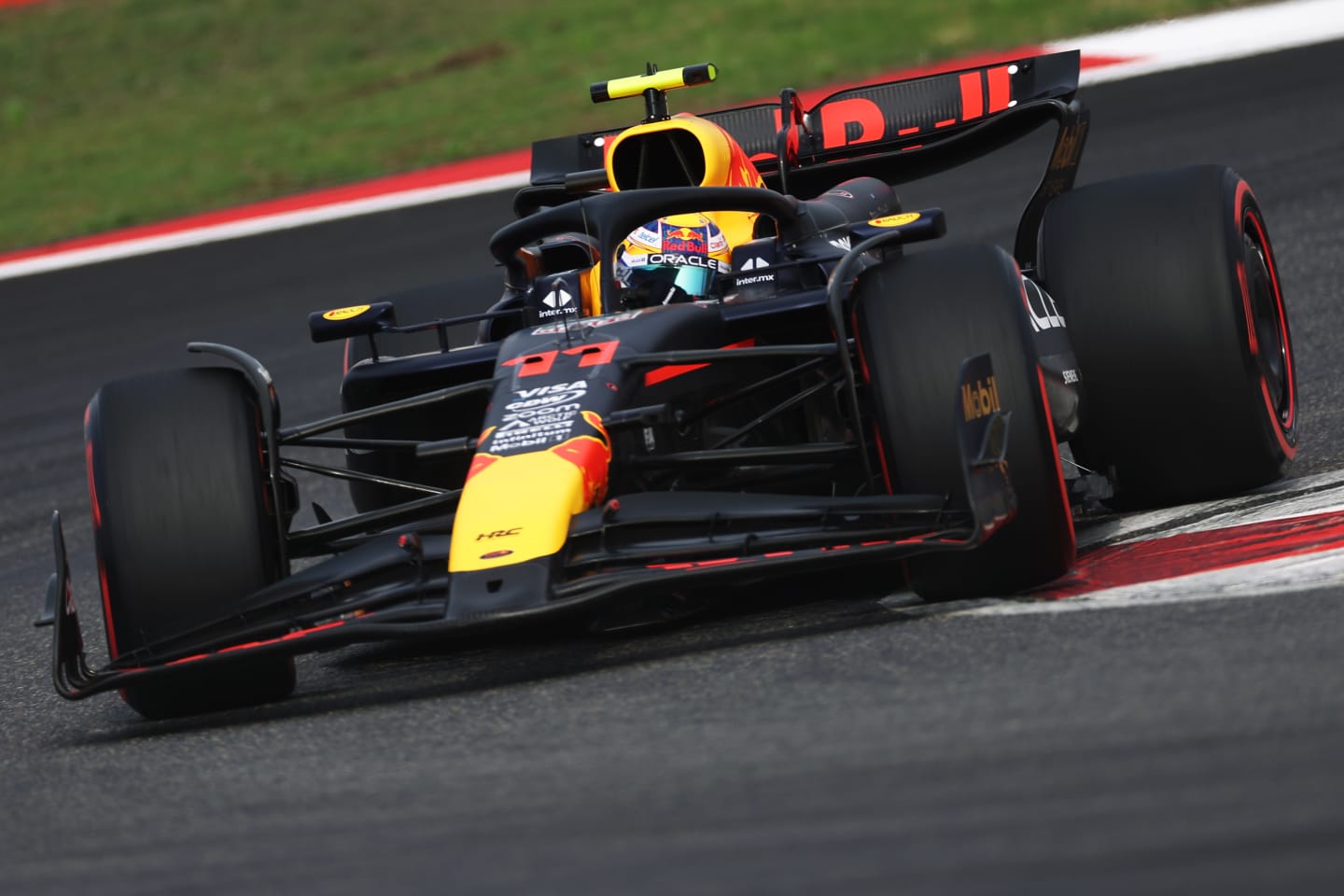 SHANGHAI, CHINA - APRIL 20: Sergio Perez of Mexico driving the (11) Oracle Red Bull Racing RB20 on track during qualifying ahead of the F1 Grand Prix of China at Shanghai International Circuit on April 20, 2024 in Shanghai, China. (Photo by Lars Baron/Getty Images)