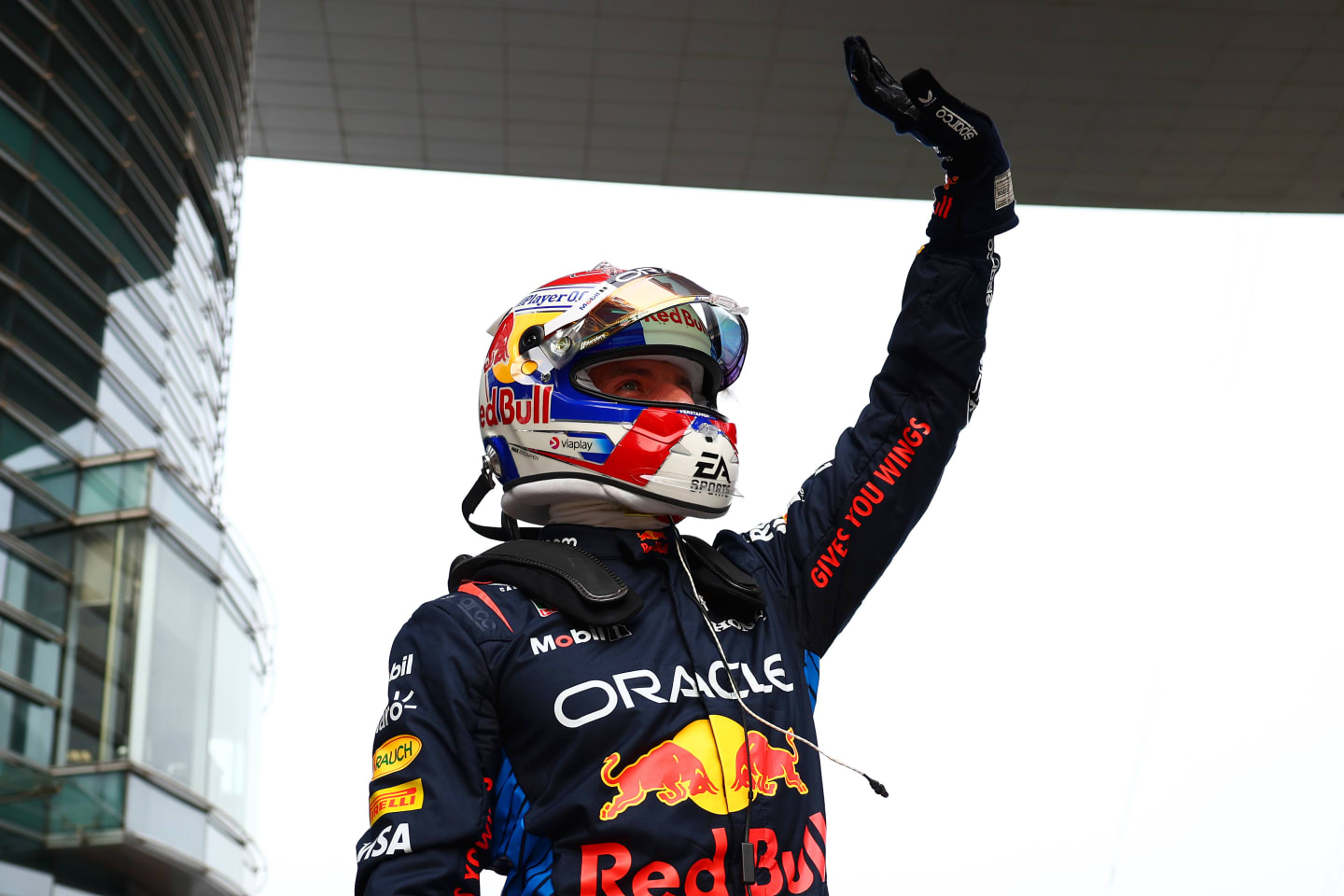 SHANGHAI, CHINA - APRIL 20: Pole position qualifier Max Verstappen of the Netherlands and Oracle Red Bull Racing celebrates in parc ferme after qualifying ahead of the F1 Grand Prix of China at Shanghai International Circuit on April 20, 2024 in Shanghai, China. (Photo by Bryn Lennon - Formula 1/Formula 1 via Getty Images)