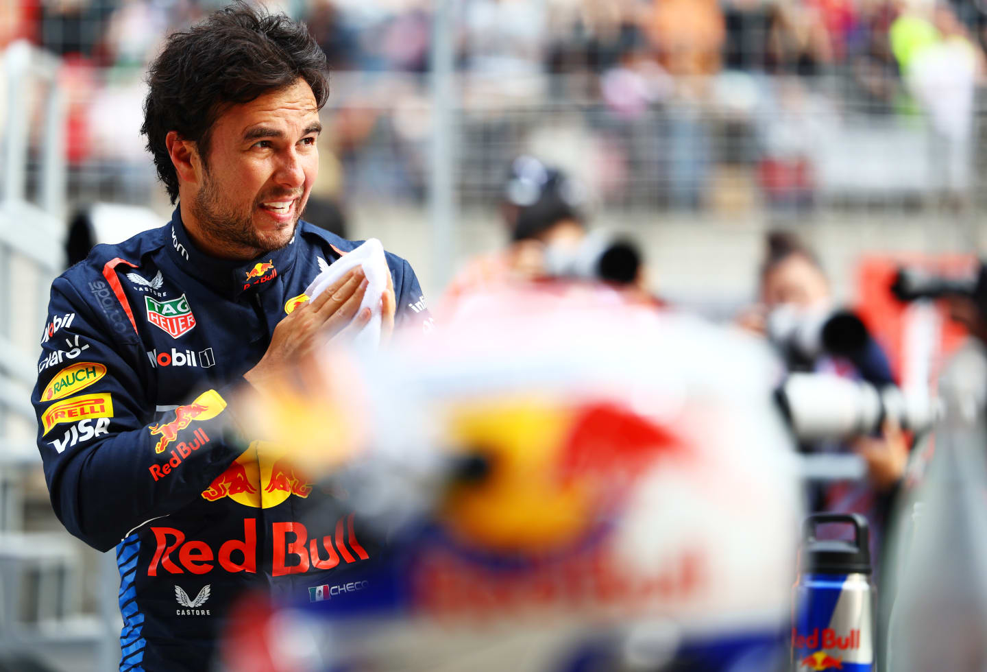 SHANGHAI, CHINA - APRIL 20: Second placed qualifier Sergio Perez of Mexico and Oracle Red Bull Racing looks on in parc ferme after qualifying ahead of the F1 Grand Prix of China at Shanghai International Circuit on April 20, 2024 in Shanghai, China. (Photo by Mark Thompson/Getty Images)