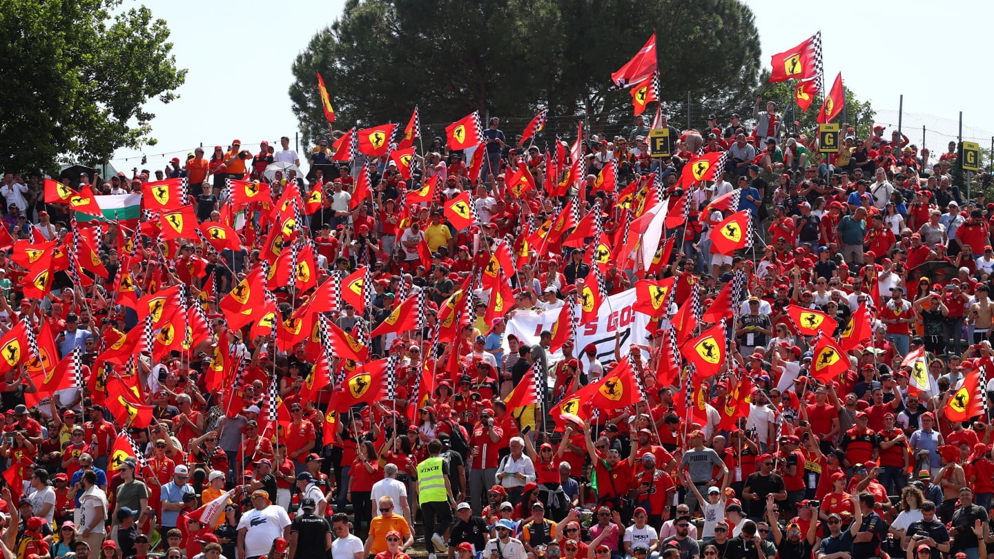 IMOLA, ITALY - MAY 19: Ferrari fans wave flags to show their support prior to the F1 Grand Prix of