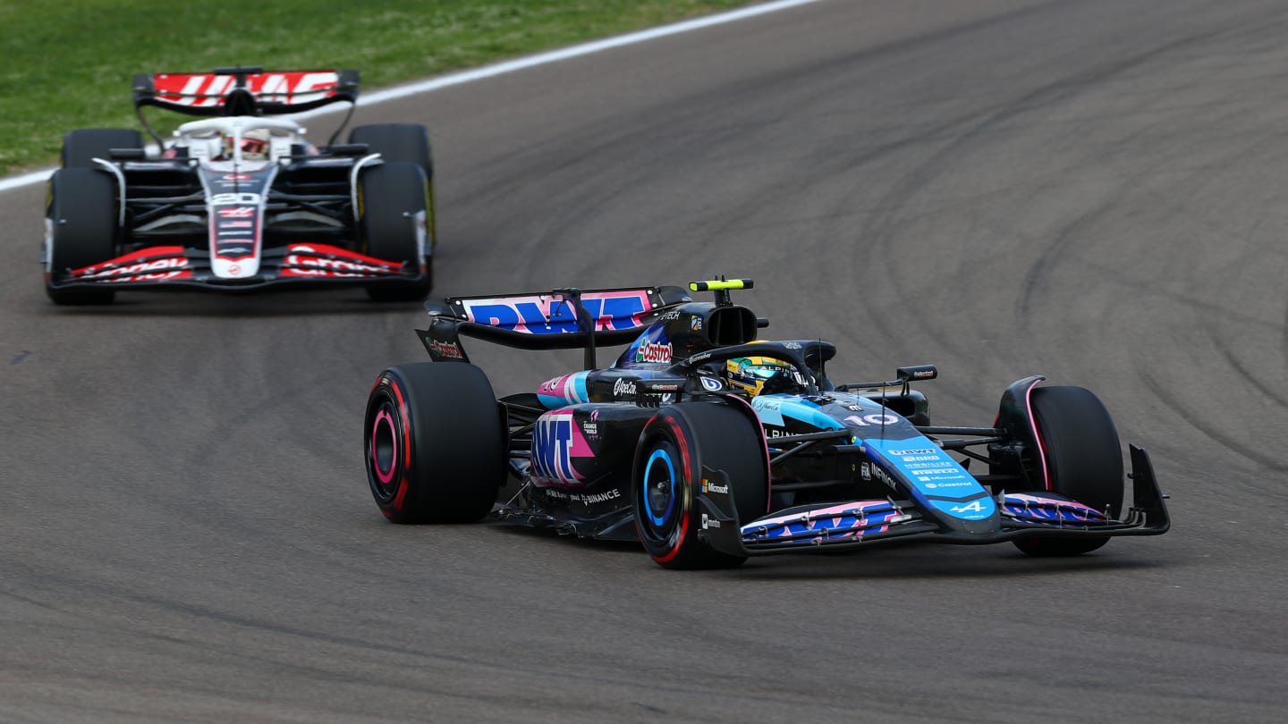 IMOLA, ITALY - MAY 19: Pierre Gasly of France driving the (10) Alpine F1 A524 Renault leads Kevin Magnussen of Denmark driving the (20) Haas F1 VF-24 Ferrari during the F1 Grand Prix of Emilia-Romagna at Autodromo Enzo e Dino Ferrari Circuit on May 19, 2024 in Imola, Italy. (Photo by Peter Fox - Formula 1/Formula 1 via Getty Images)