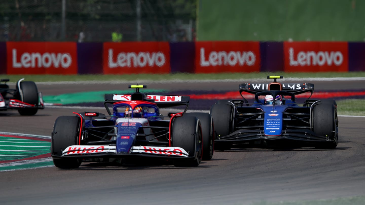 IMOLA, ITALY - MAY 19: Yuki Tsunoda of Japan driving the (22) Visa Cash App RB VCARB 01 leads Logan Sargeant of United States driving the (2) Williams FW46 Mercedes during the F1 Grand Prix of Emilia-Romagna at Autodromo Enzo e Dino Ferrari Circuit on May 19, 2024 in Imola, Italy. (Photo by Joe Portlock - Formula 1/Formula 1 via Getty Images)