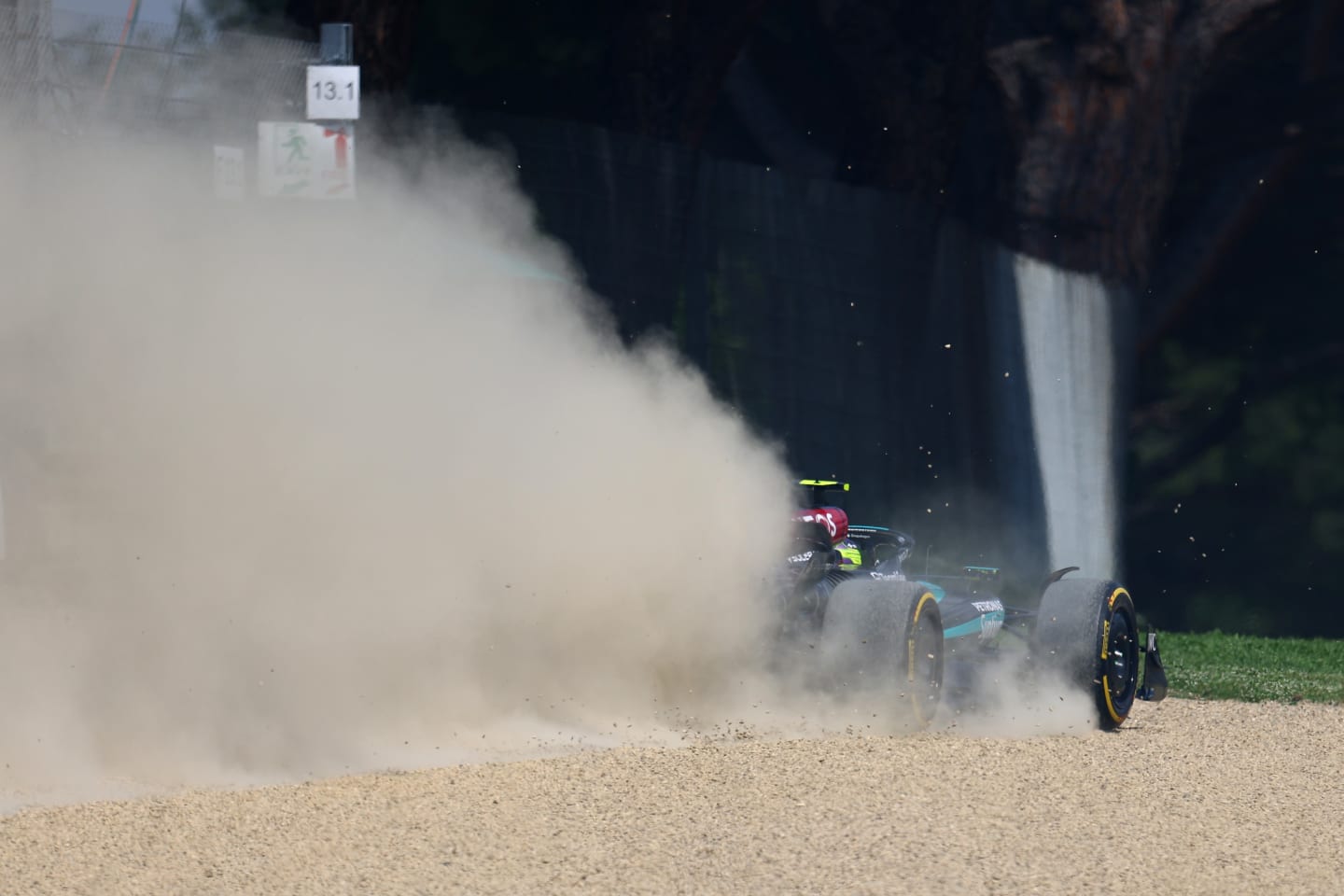 IMOLA, ITALY - MAY 19: Lewis Hamilton of Great Britain driving the (44) Mercedes AMG Petronas F1 Team W15 runs onto the gravel during the F1 Grand Prix of Emilia-Romagna at Autodromo Enzo e Dino Ferrari Circuit on May 19, 2024 in Imola, Italy. (Photo by Clive Rose/Getty Images)