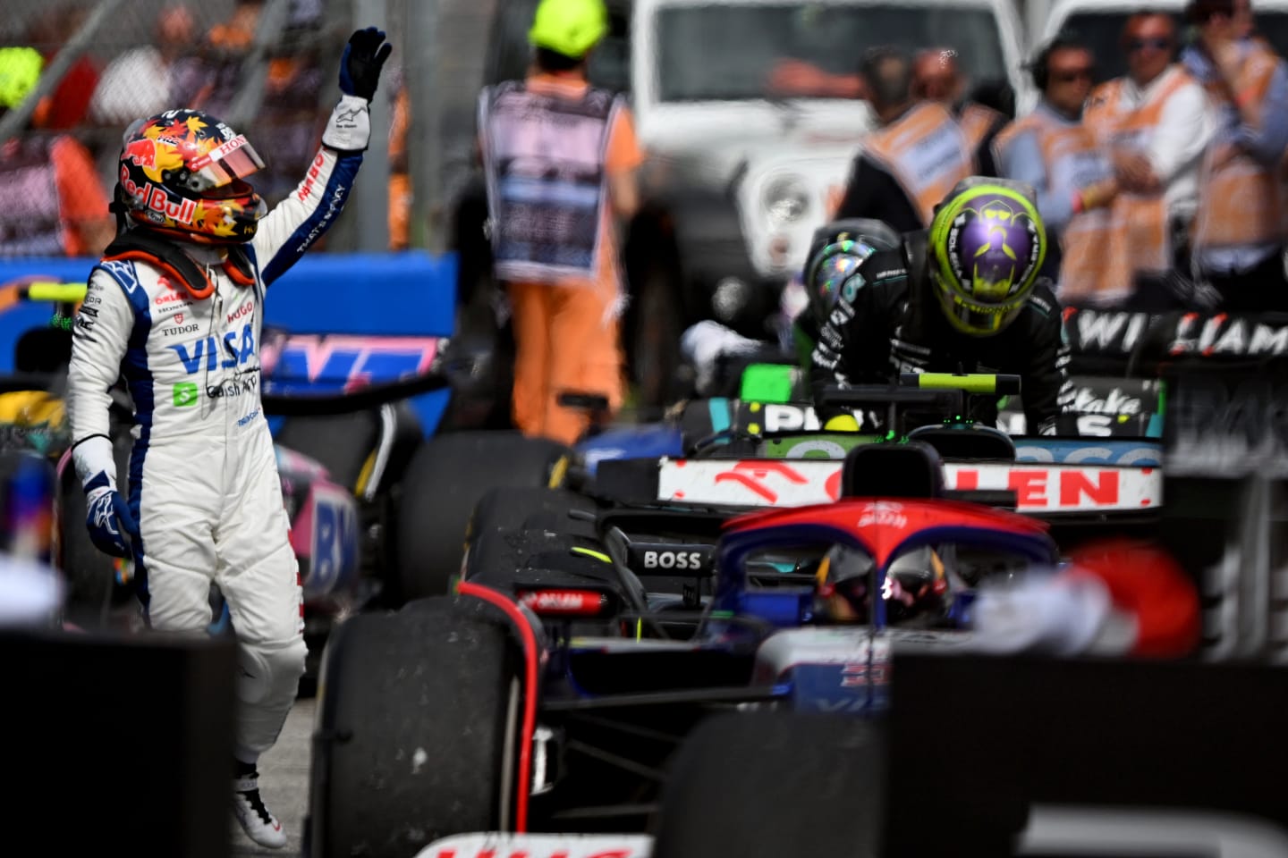 IMOLA, ITALY - MAY 19: 10th placed Yuki Tsunoda of Japan and Visa Cash App RB waves to the crowd in parc ferme during the F1 Grand Prix of Emilia-Romagna at Autodromo Enzo e Dino Ferrari Circuit on May 19, 2024 in Imola, Italy. (Photo by Rudy Carezzevoli/Getty Images)
