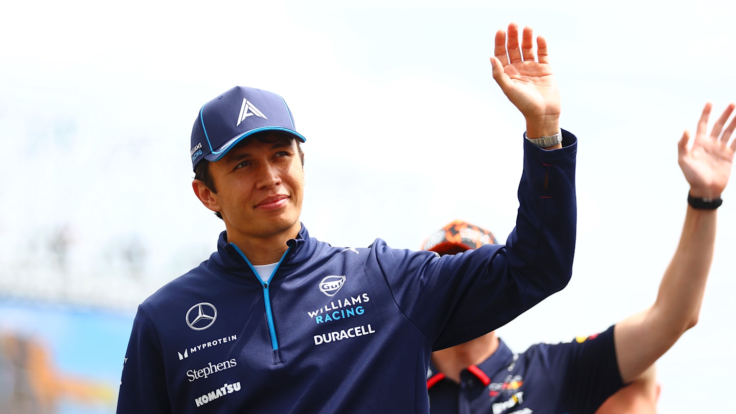 BUDAPEST, HUNGARY - JULY 21: Alexander Albon of Thailand and Williams waves to the crowd on the drivers parade prior to the F1 Grand Prix of Hungary at Hungaroring on July 21, 2024 in Budapest, Hungary. (Photo by Bryn Lennon - Formula 1/Formula 1 via Getty Images)