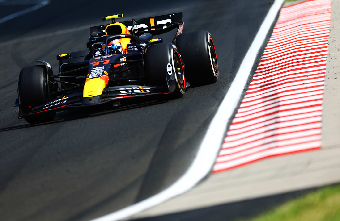 BUDAPEST, HUNGARY - JULY 21: Sergio Perez of Mexico driving the (11) Oracle Red Bull Racing RB20 on track during the F1 Grand Prix of Hungary at Hungaroring on July 21, 2024 in Budapest, Hungary. (Photo by Mark Thompson/Getty Images)