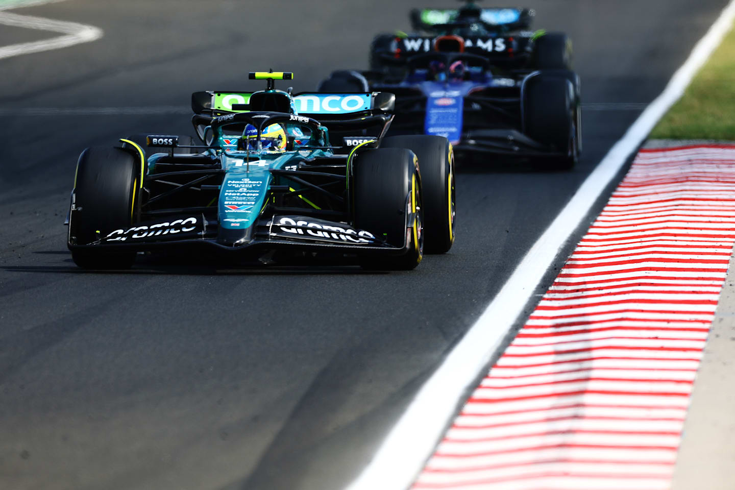 BUDAPEST, HUNGARY - JULY 21: Fernando Alonso of Spain driving the (14) Aston Martin AMR24 Mercedes on track during the F1 Grand Prix of Hungary at Hungaroring on July 21, 2024 in Budapest, Hungary. (Photo by Mark Thompson/Getty Images)