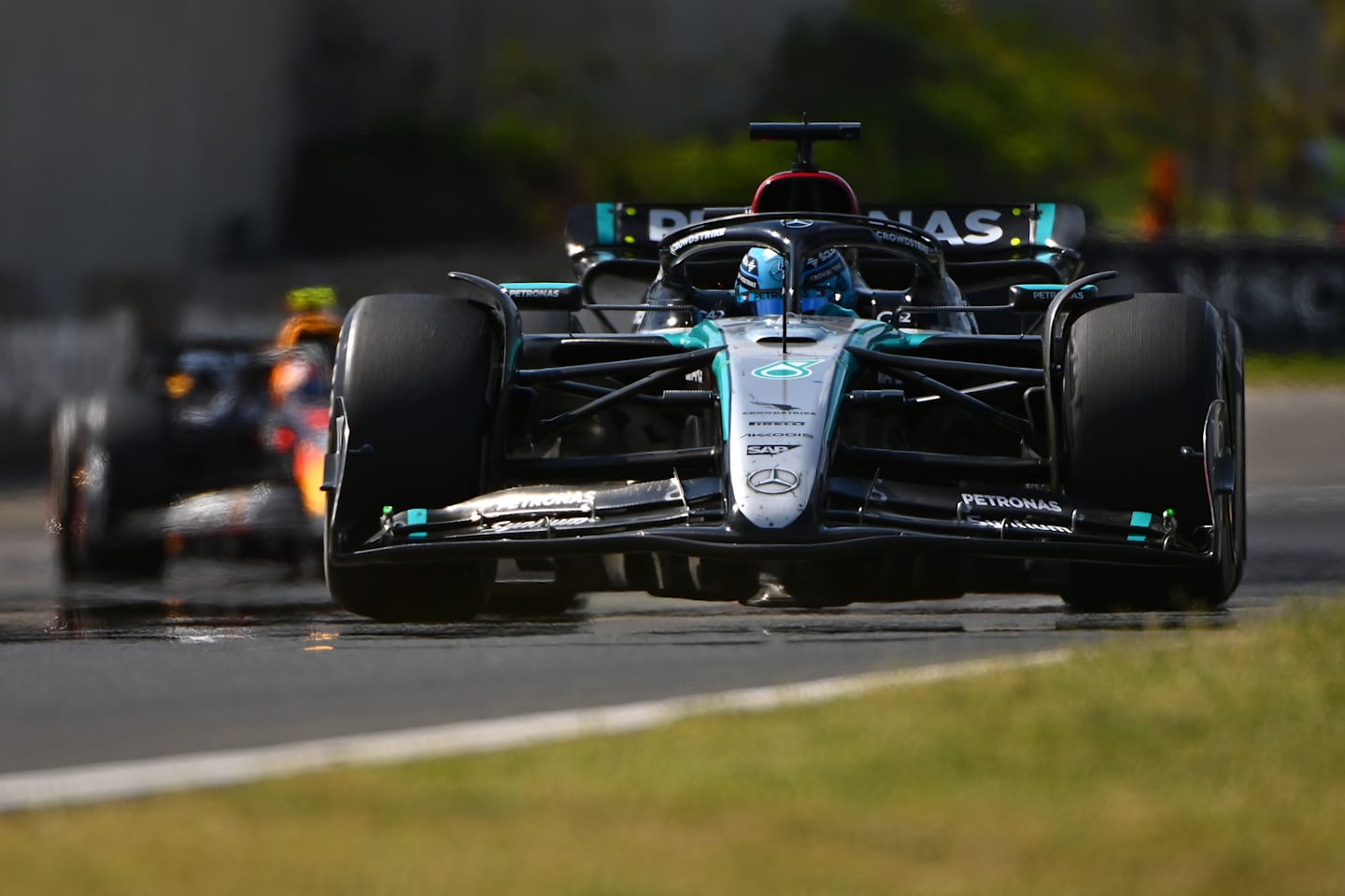 BUDAPEST, HUNGARY - JULY 21: George Russell of Great Britain driving the (63) Mercedes AMG Petronas F1 Team W15 on track  during the F1 Grand Prix of Hungary at Hungaroring on July 21, 2024 in Budapest, Hungary. (Photo by James Sutton - Formula 1/Formula 1 via Getty Images)