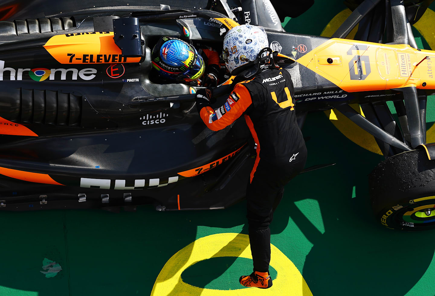 BUDAPEST, HUNGARY - JULY 21: Race winner Oscar Piastri of Australia and McLaren and Second placed Lando Norris of Great Britain and McLaren celebrate in parc ferme during the F1 Grand Prix of Hungary at Hungaroring on July 21, 2024 in Budapest, Hungary. (Photo by Mark Thompson/Getty Images)