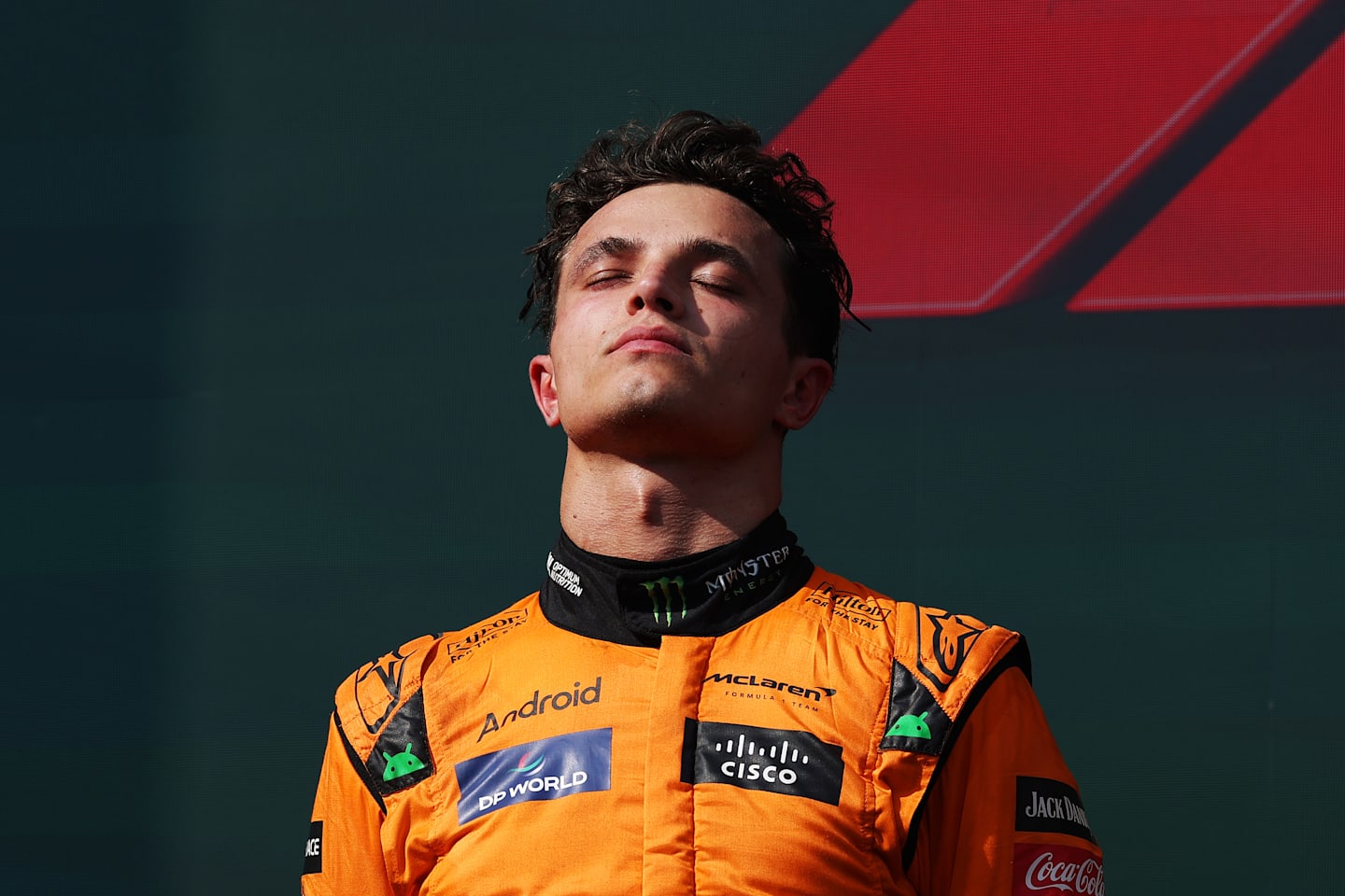 BUDAPEST, HUNGARY - JULY 21: Second placed Lando Norris of Great Britain and McLaren stands on the podium during the F1 Grand Prix of Hungary at Hungaroring on July 21, 2024 in Budapest, Hungary. (Photo by Dean Mouhtaropoulos/Getty Images)