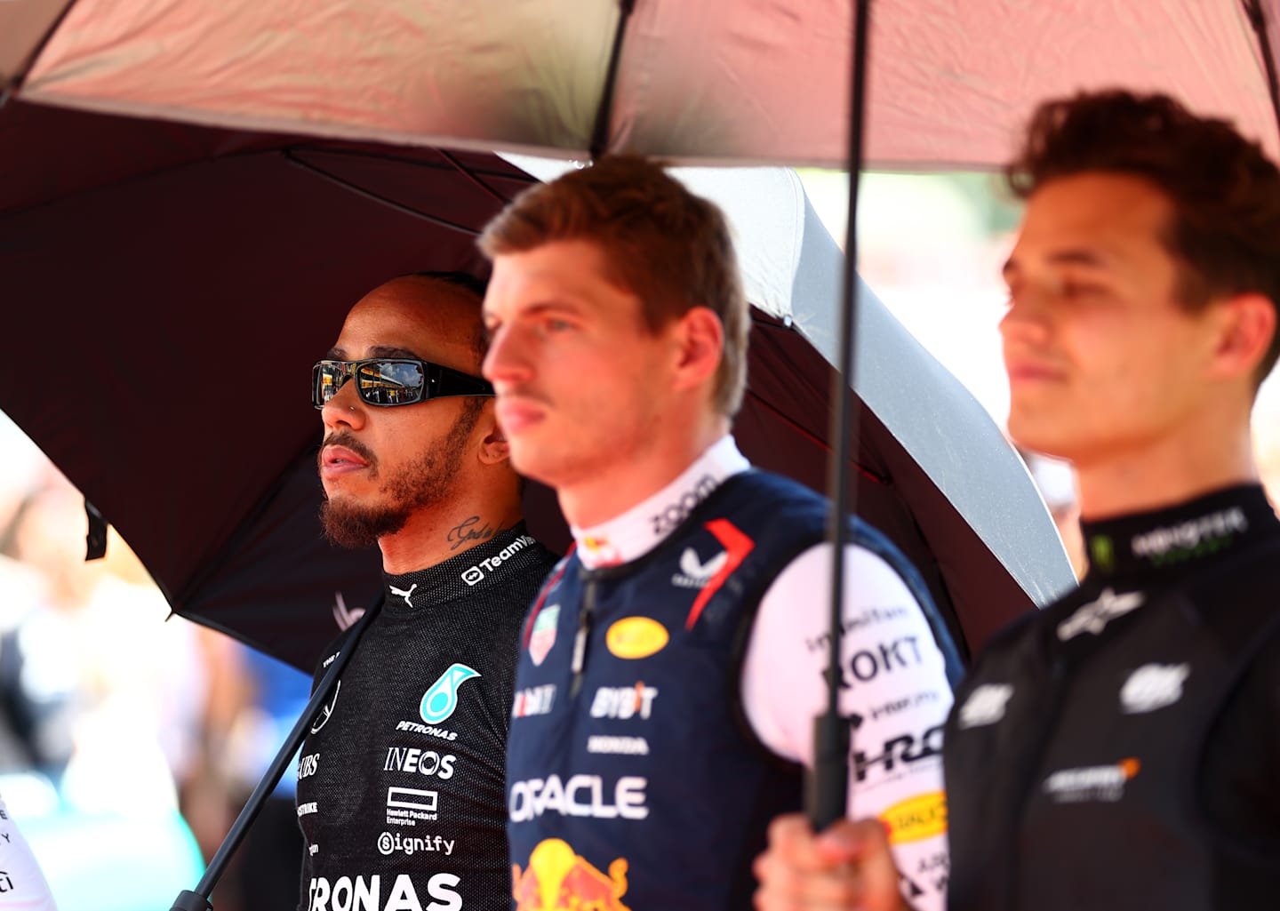 BUDAPEST, HUNGARY - JULY 21: Lewis Hamilton of Great Britain and Mercedes stands for the national