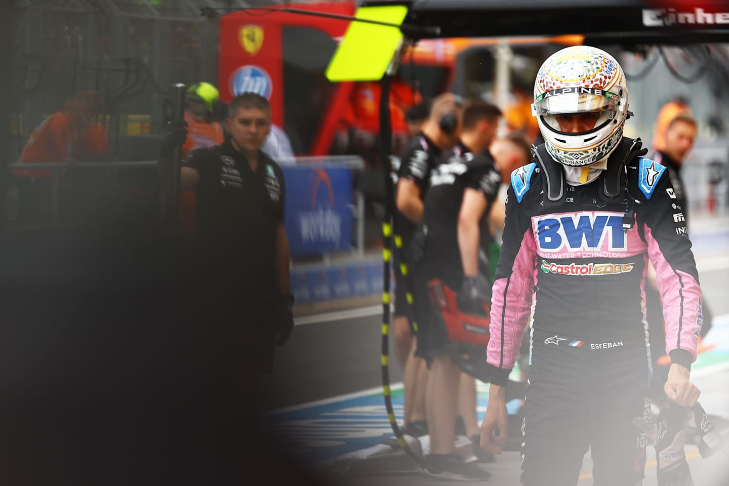 BUDAPEST, HUNGARY - JULY 20: 19th placed qualifier Esteban Ocon of France and Alpine F1 walks in the Pitlane during qualifying ahead of the F1 Grand Prix of Hungary at Hungaroring on July 20, 2024 in Budapest, Hungary. (Photo by Mark Thompson/Getty Images)