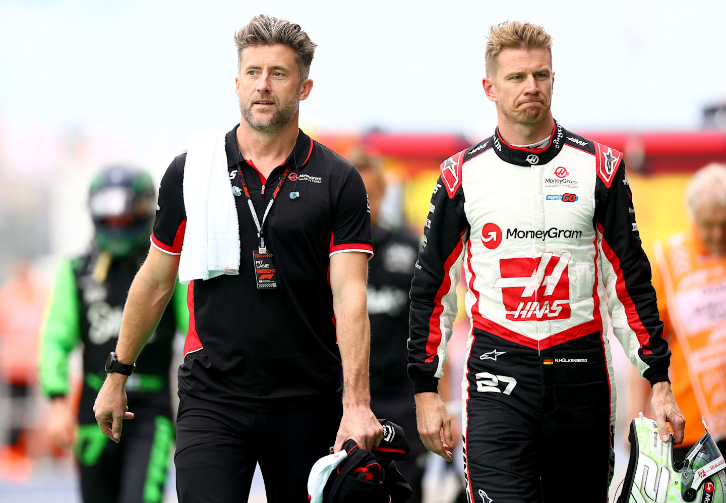 BUDAPEST, HUNGARY - JULY 20: 11th placed qualifier Nico Hulkenberg of Germany and Haas F1 walks in the Pitlane during qualifying ahead of the F1 Grand Prix of Hungary at Hungaroring on July 20, 2024 in Budapest, Hungary. (Photo by Bryn Lennon - Formula 1/Formula 1 via Getty Images)