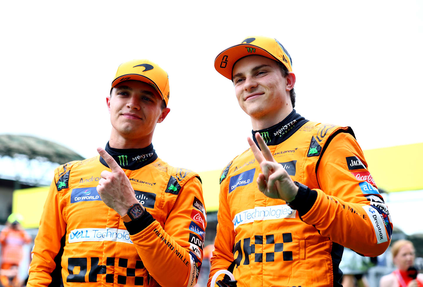 BUDAPEST, HUNGARY - JULY 20: Pole position qualifier Lando Norris of Great Britain and McLaren and Second placed qualifier Oscar Piastri of Australia and McLaren celebrates  in parc ferme during qualifying ahead of the F1 Grand Prix of Hungary at Hungaroring on July 20, 2024 in Budapest, Hungary. (Photo by Bryn Lennon - Formula 1/Formula 1 via Getty Images)