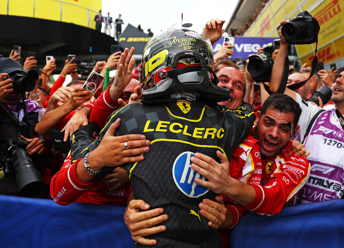 MONZA, ITALY - SEPTEMBER 01: Race winner Charles Leclerc of Monaco and Ferrari celebrates in parc ferme during the F1 Grand Prix of Italy at Autodromo Nazionale Monza on September 01, 2024 in Monza, Italy. (Photo by Bryn Lennon - Formula 1/Formula 1 via Getty Images)