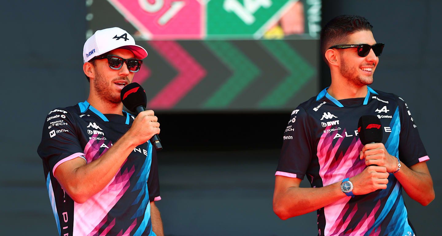 MONZA, ITALY - AUGUST 30: Pierre Gasly of France and Alpine F1 and Esteban Ocon of France and Alpine F1 on the fan forum stage prior to practice ahead of the F1 Grand Prix of Italy. (Photo by Peter Fox - Formula 1/Formula 1 via Getty Images)