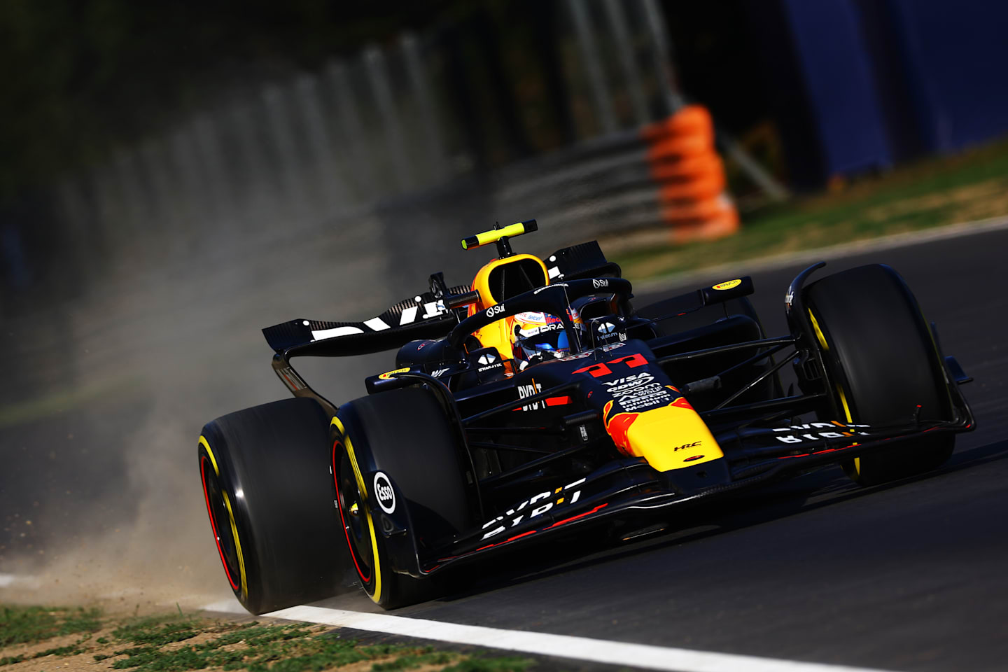 MONZA, ITALY - AUGUST 30: Sergio Perez of Mexico driving the (11) Oracle Red Bull Racing RB20 on track during practice ahead of the F1 Grand Prix of Italy at Autodromo Nazionale Monza on August 30, 2024 in Monza, Italy. (Photo by Mark Thompson/Getty Images)