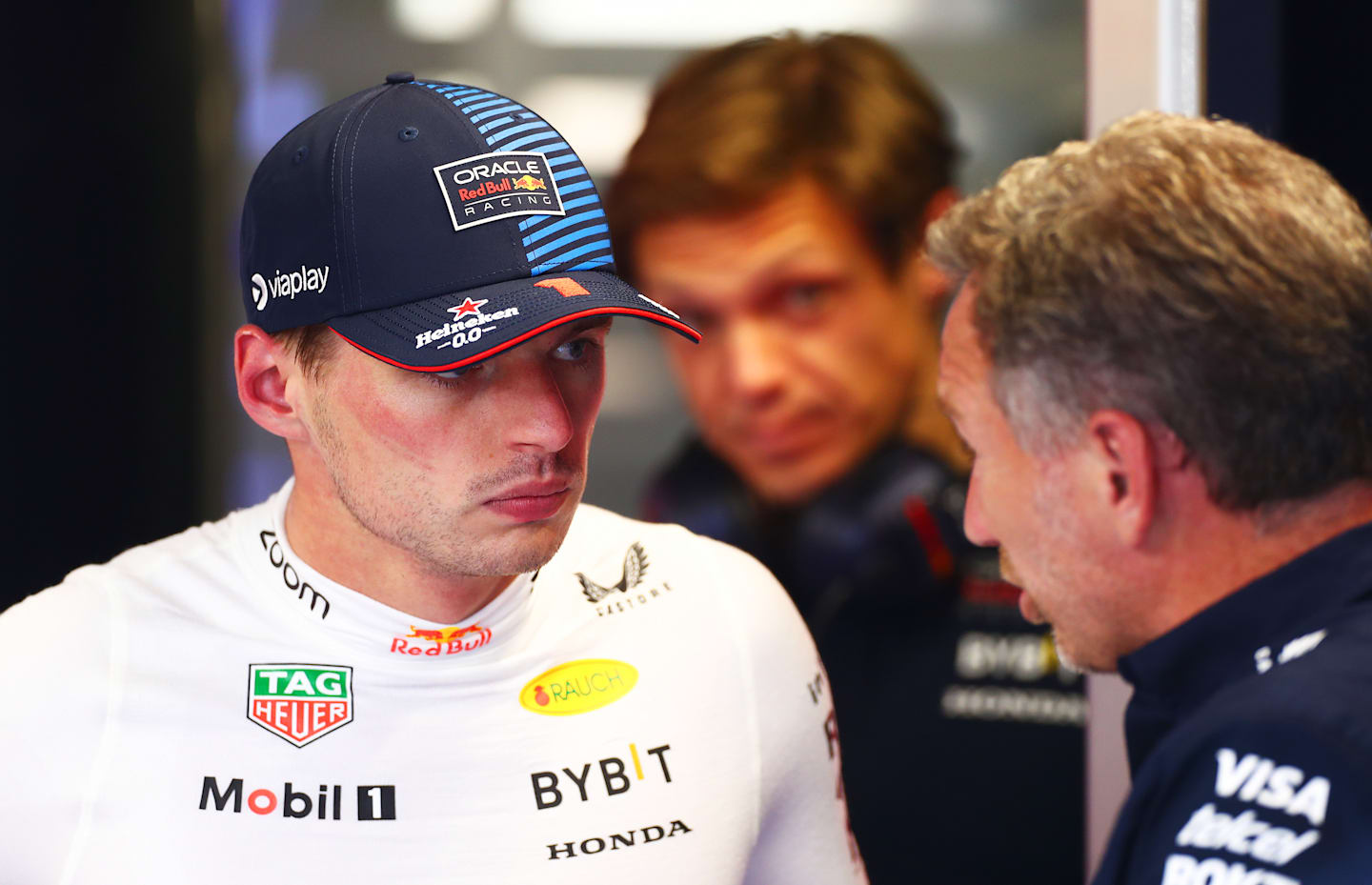 MONZA, ITALY - AUGUST 30: Max Verstappen of the Netherlands and Oracle Red Bull Racing talks to Oracle Red Bull Racing Team Principal Christian Horner in the garage during practice ahead of the F1 Grand Prix of Italy at Autodromo Nazionale Monza on August 30, 2024 in Monza, Italy. (Photo by Peter Fox - Formula 1/Formula 1 via Getty Images)