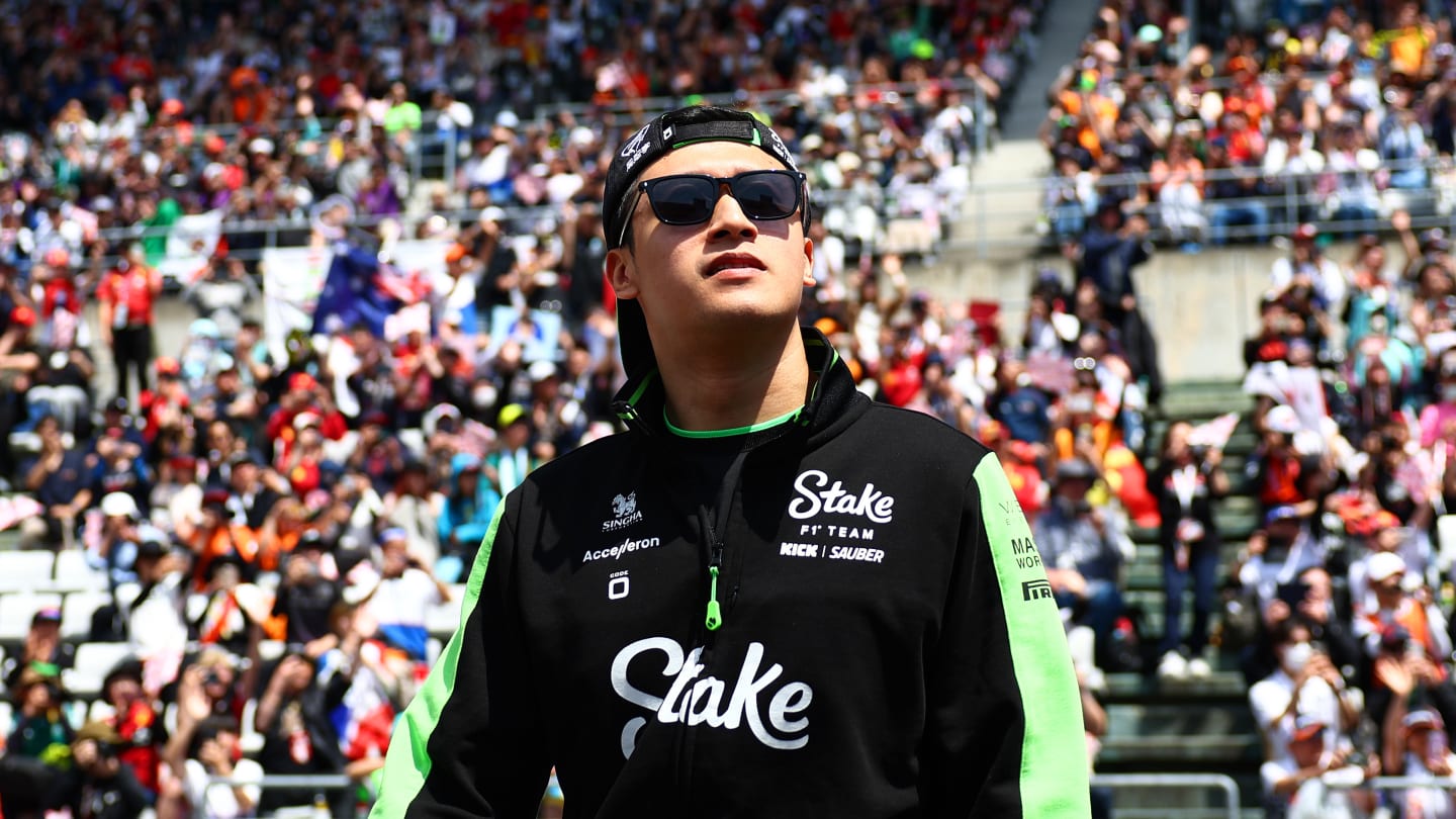 SUZUKA, JAPAN - APRIL 07: Zhou Guanyu of China and Stake F1 Team Kick Sauber looks on from the